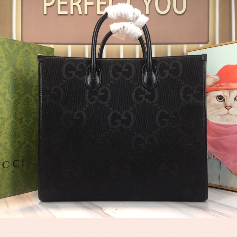 G*u*i shopping bags